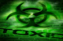 Toxic sign on black and green background